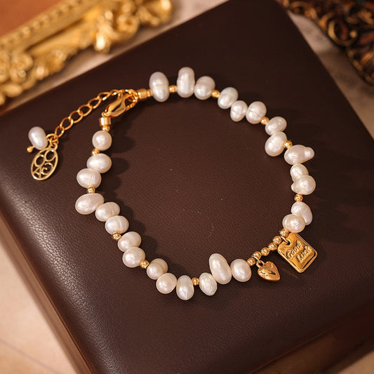 JINGGWW Lucky Charm Baroque Pearl Bracelet - Natural Freshwater Pearls & Good Luck Pendant