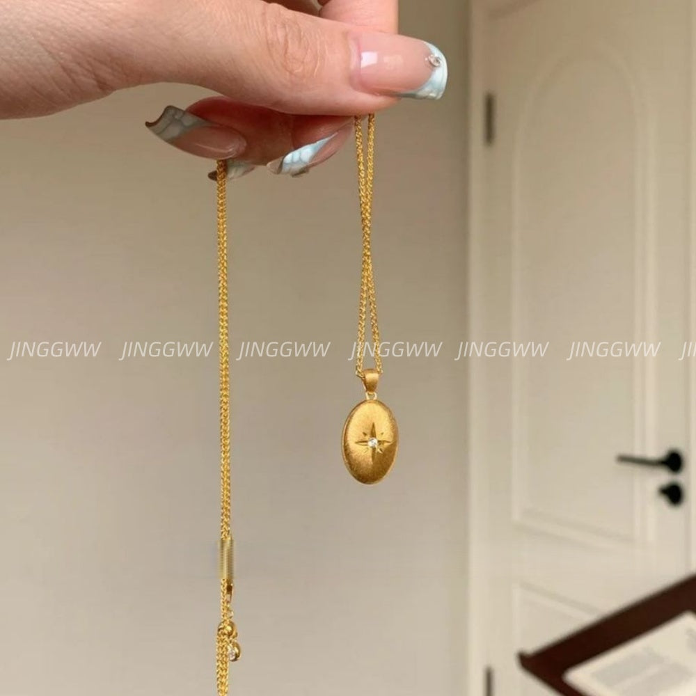 JINGGWW Celestial Guidance Necklace - Polished Oval Pendant with Cubic Zirconia Star