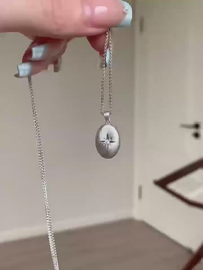 JINGGWW Celestial Guidance Necklace - Polished Oval Pendant with Cubic Zirconia Star